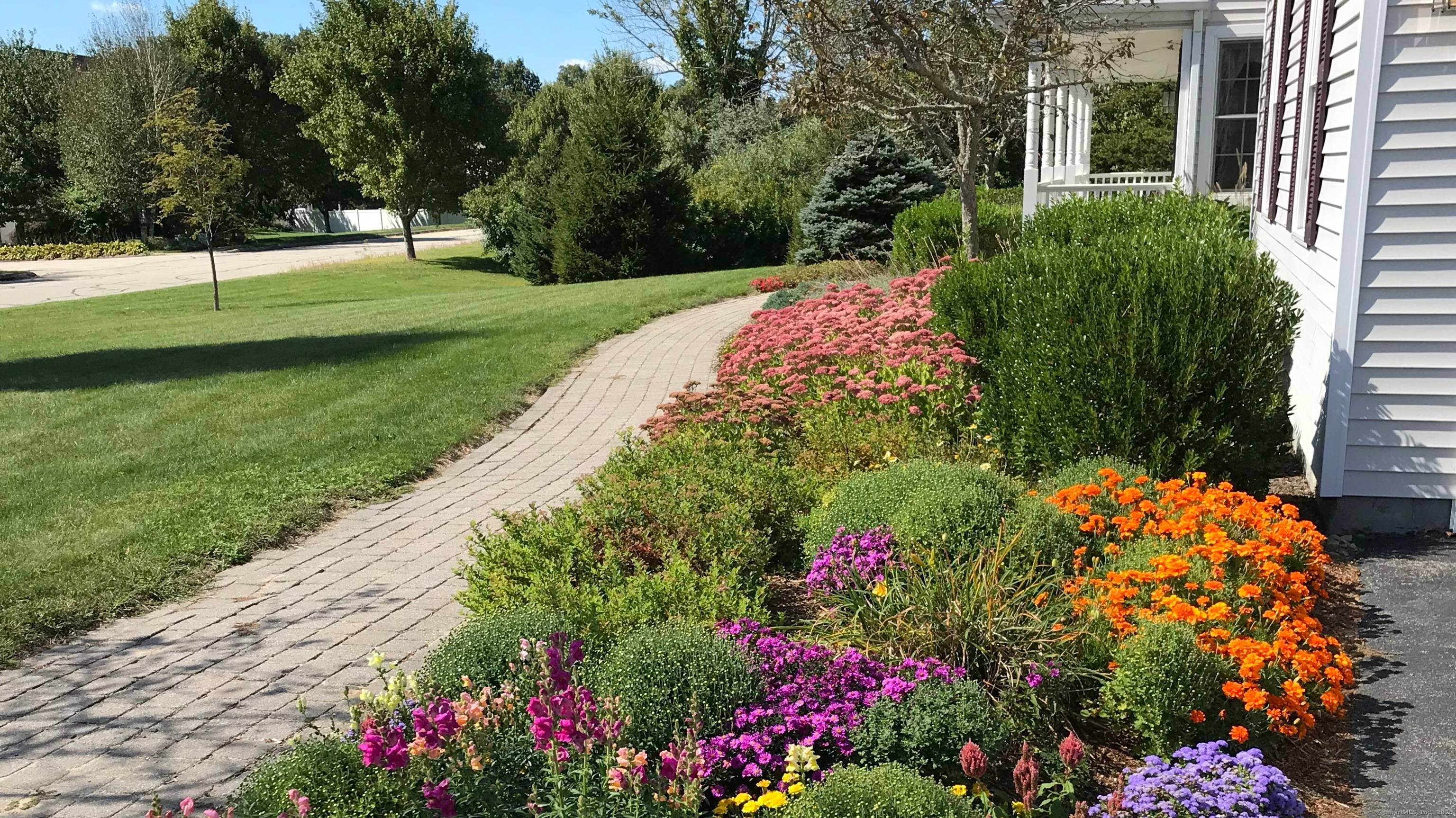 Positioned on a beautifully private lot in the heart of an upscale neighborhood, this exceptional home blends space, quality, and thoughtful design.