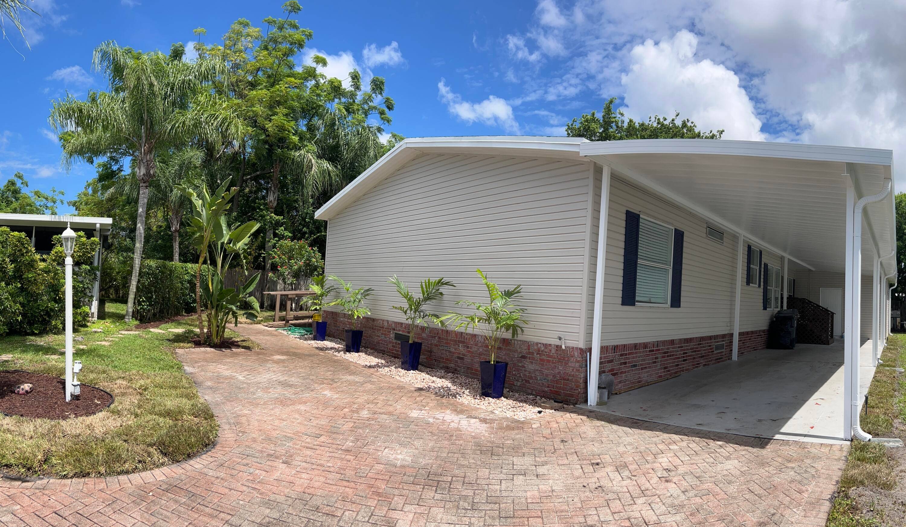 A beautiful secluded home 3 bedroom 2 bathroom is well located at the end on a cul de sac in a gated Palm Breezes Club community.