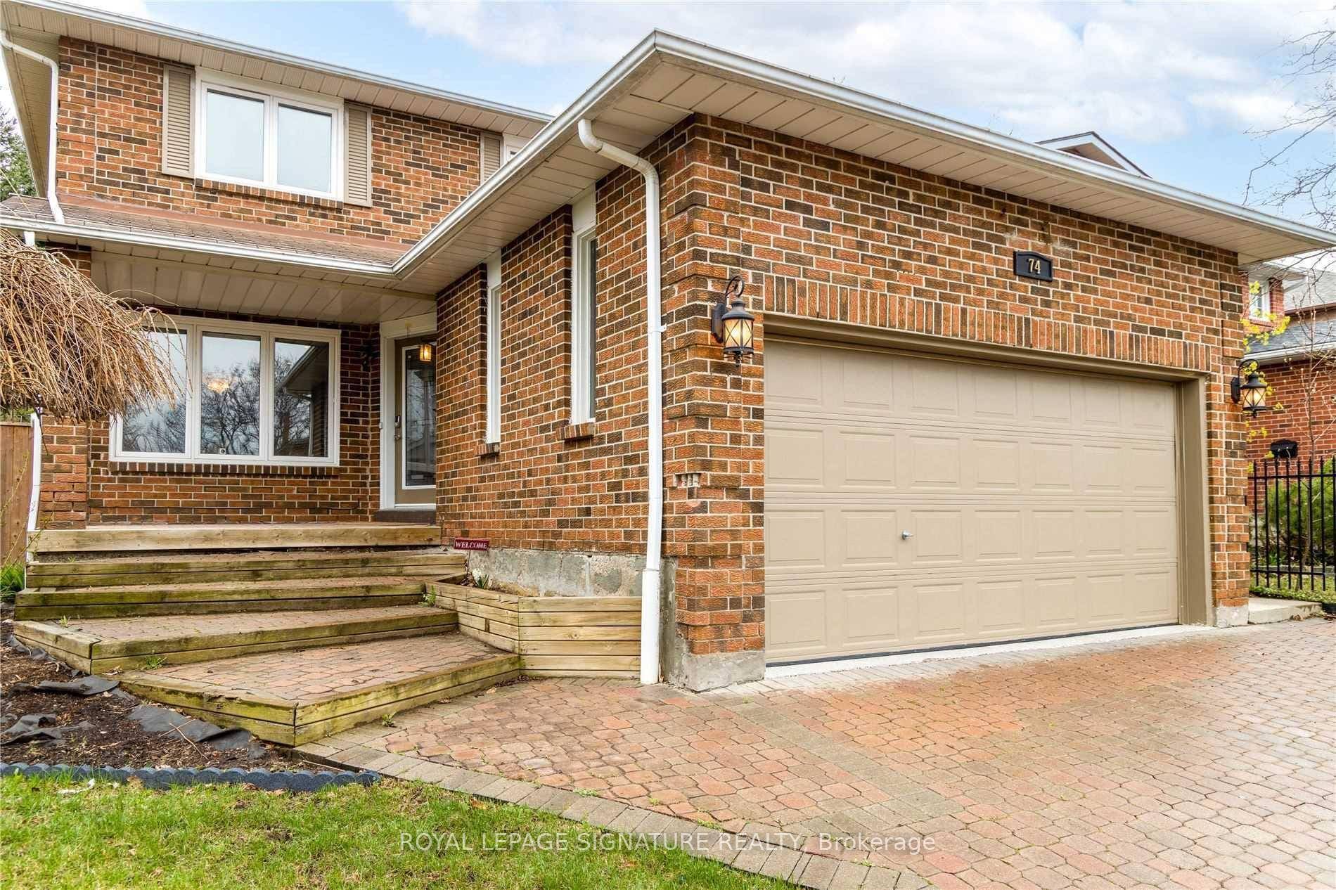 Step into a bright and welcoming open hallway that leads to an elegant layout featuring hardwood floors throughout, and an open concept living and dining area perfect for entertaining.