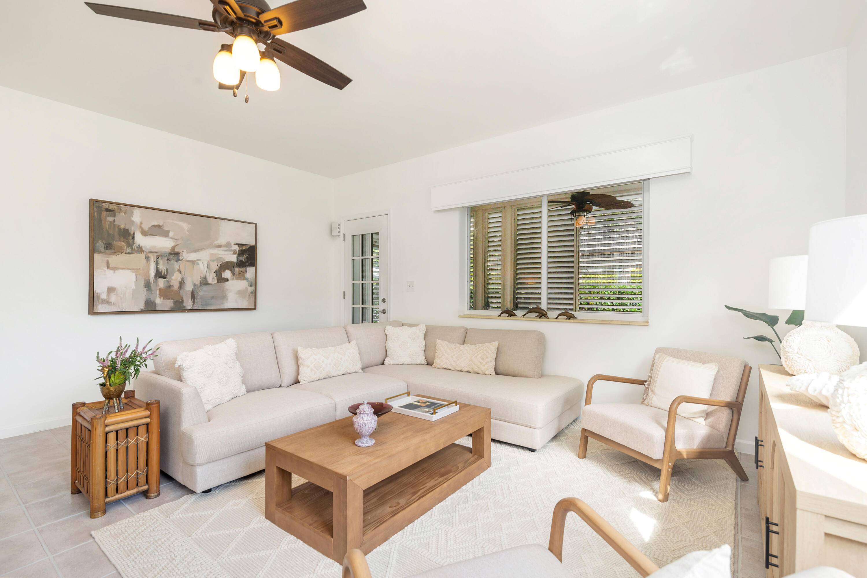 An apartment that truly lives like a home in a rarely available, in town boutique building complete with huge side yard, garden and backyard patio.