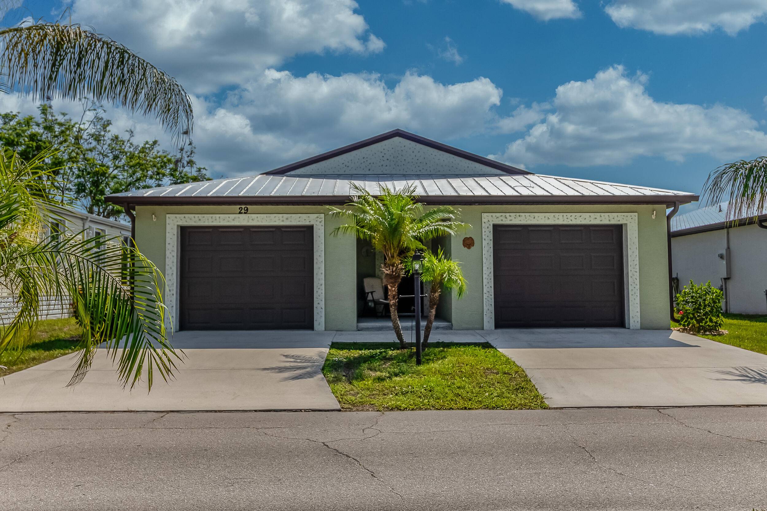 Beautifully Maintained 2 bed, 2 bath home in the welcoming 55 community of Spanish Lakes One.
