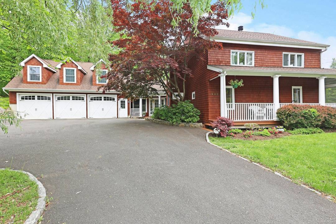 This picturesque ca 1780 farmhouse retains all of its historic charm but has been updated expanded for today including significant 3 car garage addition with magnificent great room above.