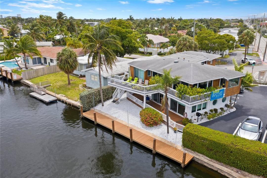 Presenting a fully renovated, turn key mixed use waterfront property on a high visibility corner just steps from Federal Highway.