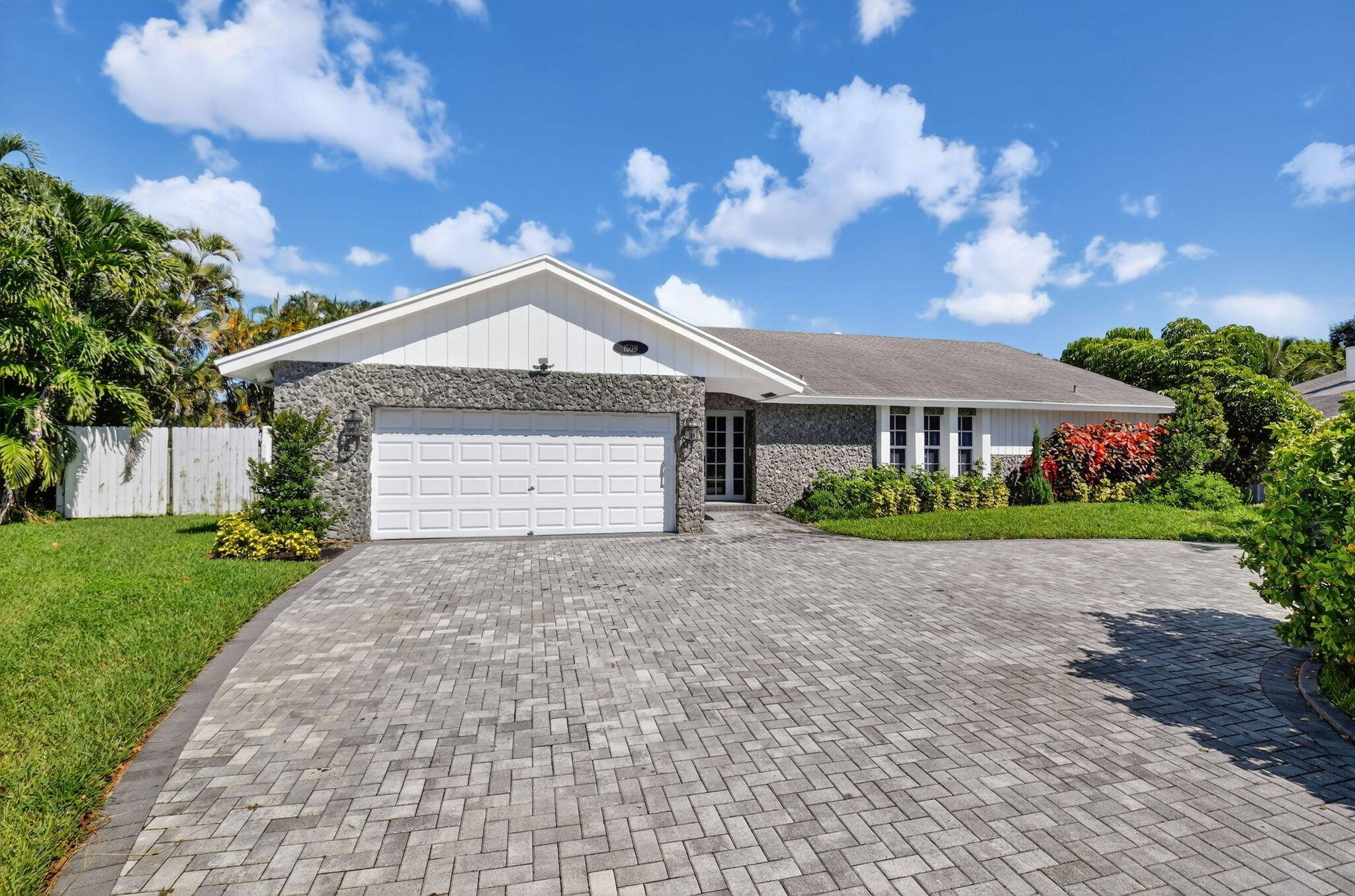 Experience the best of South Florida living in this 5 bedroom, 3.