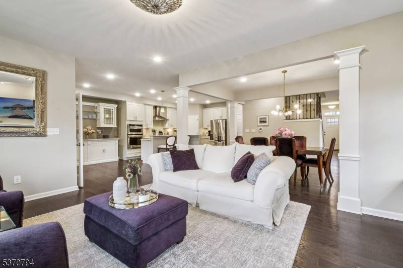 Welcome to The Gables at Woodcliff Lake an exceptional end unit townhome offering the space, privacy, and elegance of a single family home.