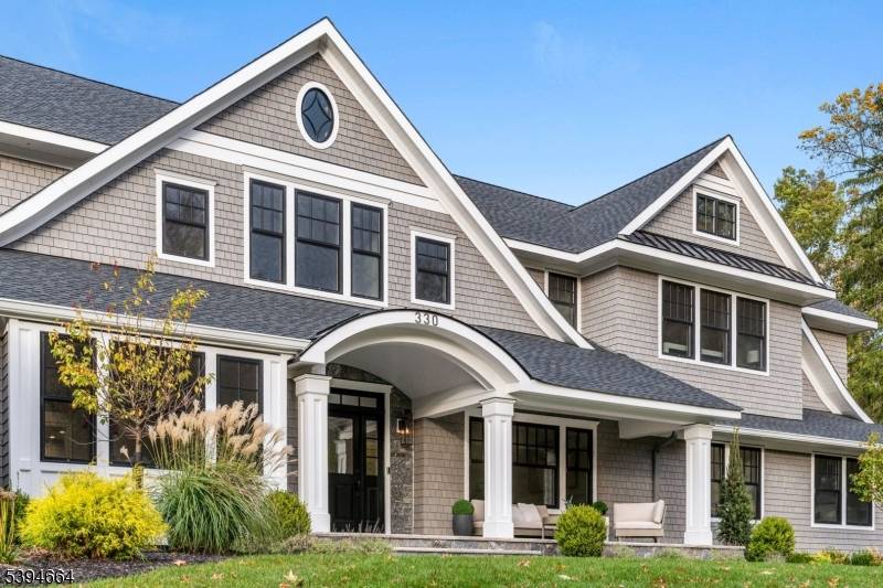 Discover Short Hills sophistication with Nantucket coastal elegance at 330 Hartshorn Drive, a newly rebuilt estate where timeless architecture meets curated modern luxury.