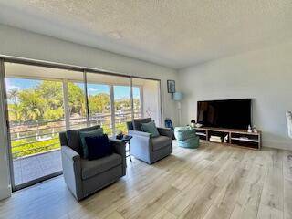 Waterfront Condo with Dock Access Fully Furnished Move In Ready !