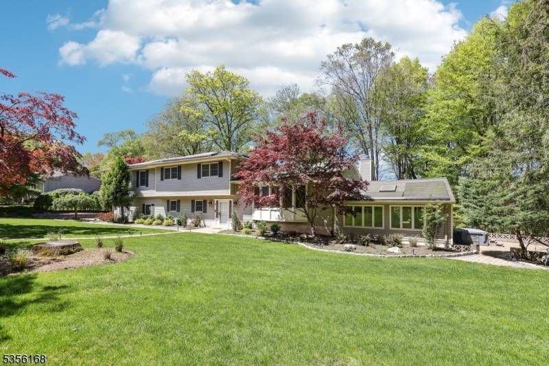 Located on a quiet cul de sac, this light, bright expanded split level home offers 4 spacious bedrooms, 4 full and 1 half baths, and a 2 car garage on ...