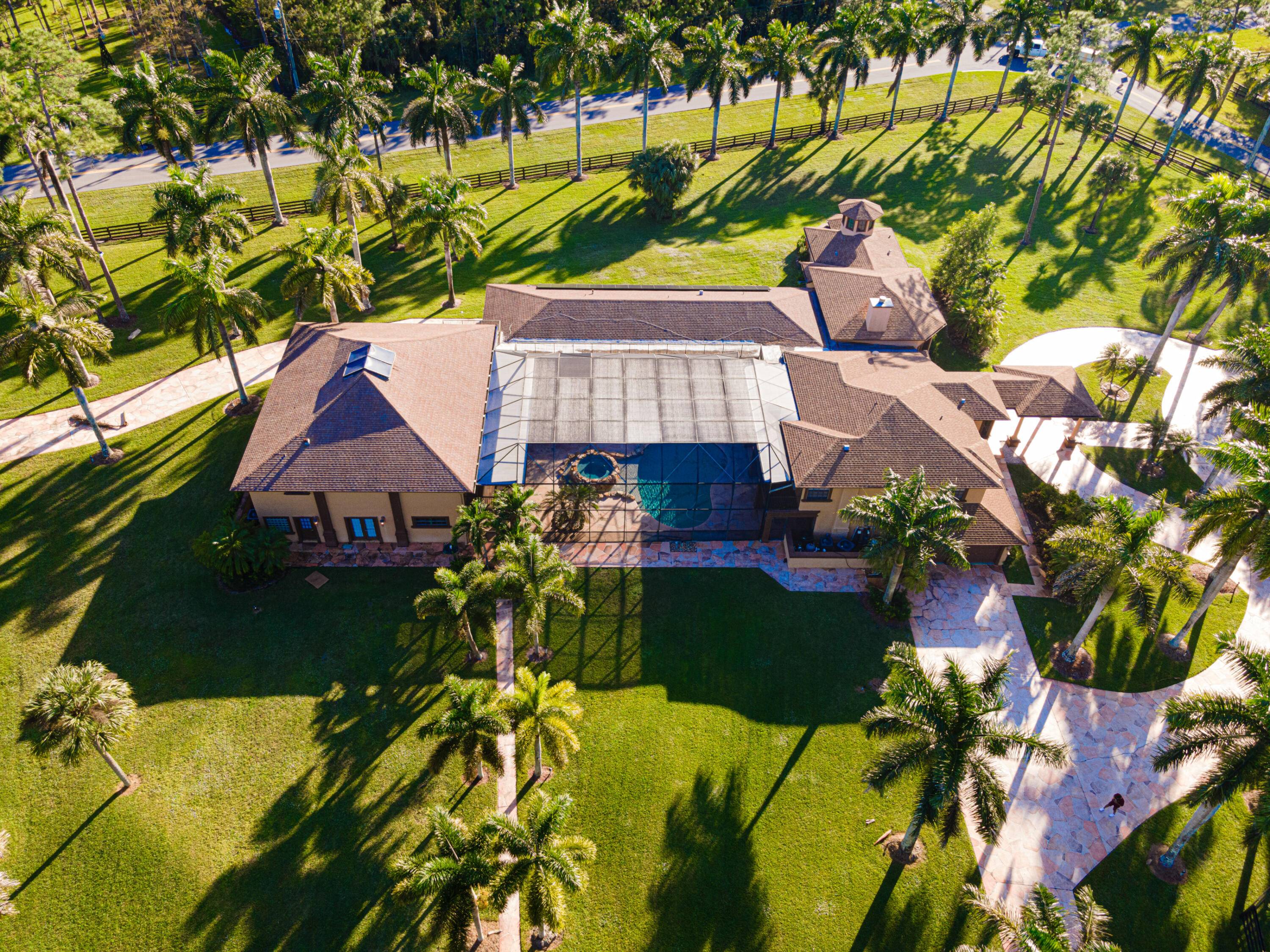Luxurious equestrian estate home with the highly desirable Gated Equestrian Community HOMELAND.