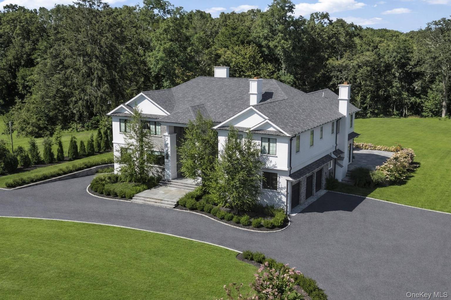 Welcome to 5 Gerry Lane, an extraordinary new construction in the prestigious Village of Lloyd Harbor.