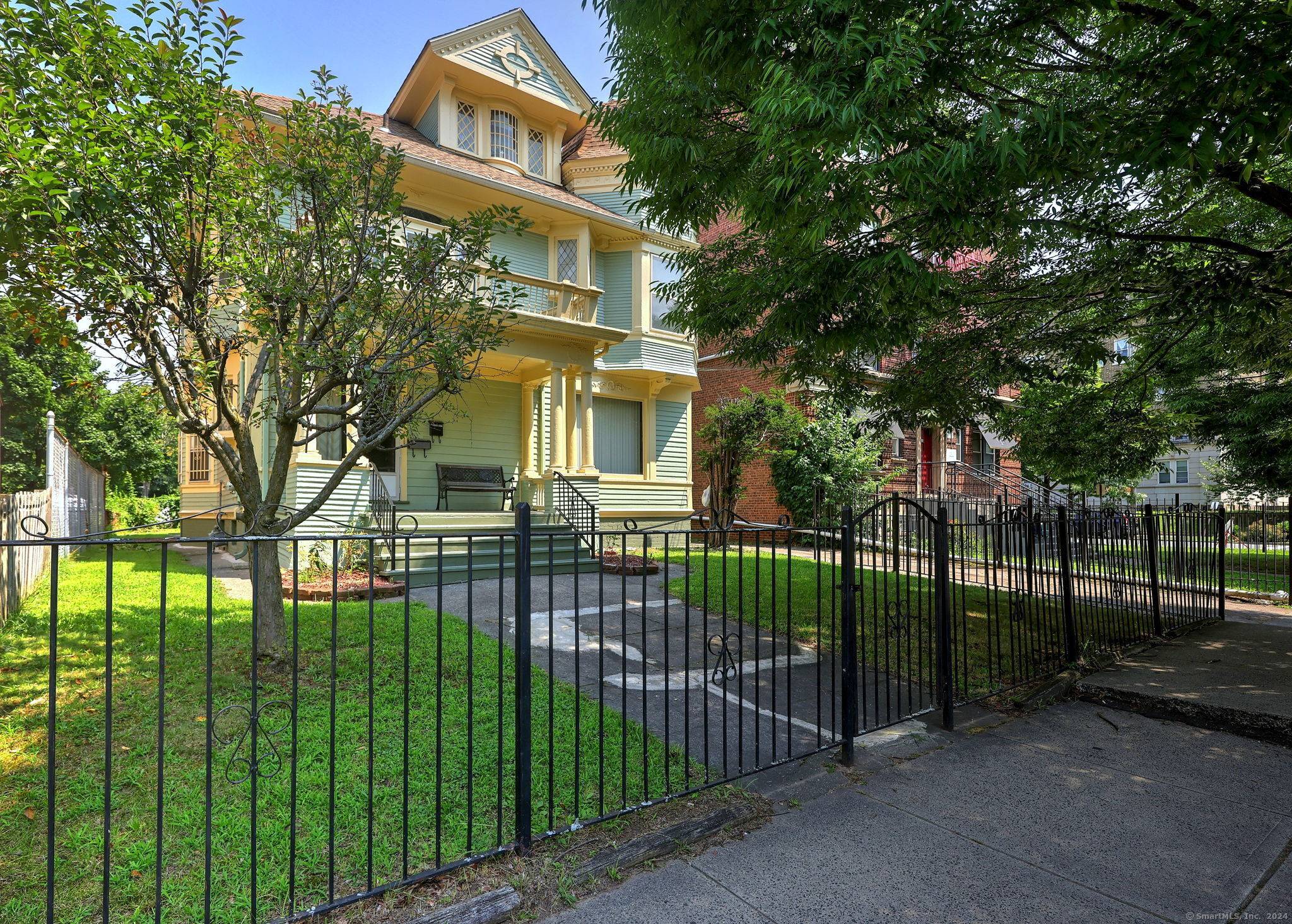 Timeless 2 Family Home with Iconic Architecture Unique Accessory Apartment Step into history with this expansive and beautifully maintained 2 family home, cherished by the same family since 1965.