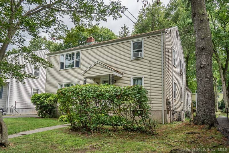 Lovely 2 family home ! Recently renovated apartments with full cabinet kitchens and stainless steel appliances.