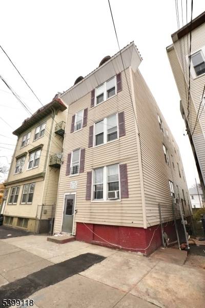 Great three family property with separate utilities, ready to generate rental income.