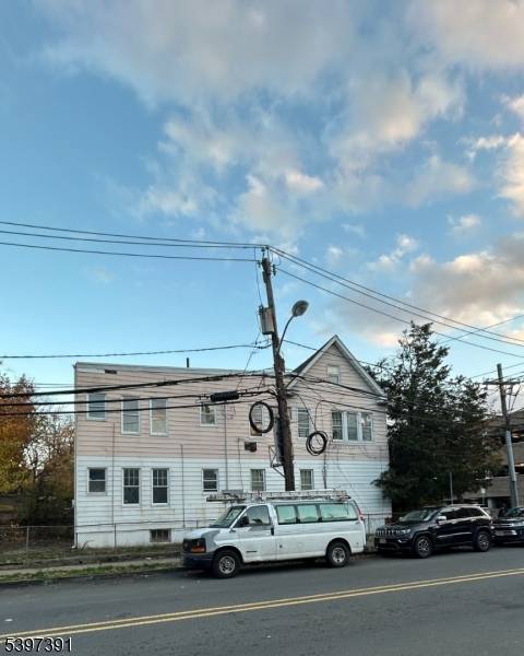 Property features a spacious 2 bedroom, 1 bath first floor unit and a multi level second unit offering 2 bedrooms and 1 bath on the main level, plus a third ...