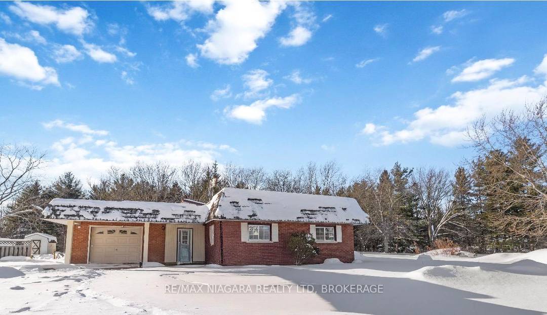 Welcome to 791 Darby Road, a charming bungalow with a rich history as the former Port Robinson schoolhouse, thoughtfully transformed into a one of a kind countryside retreat.