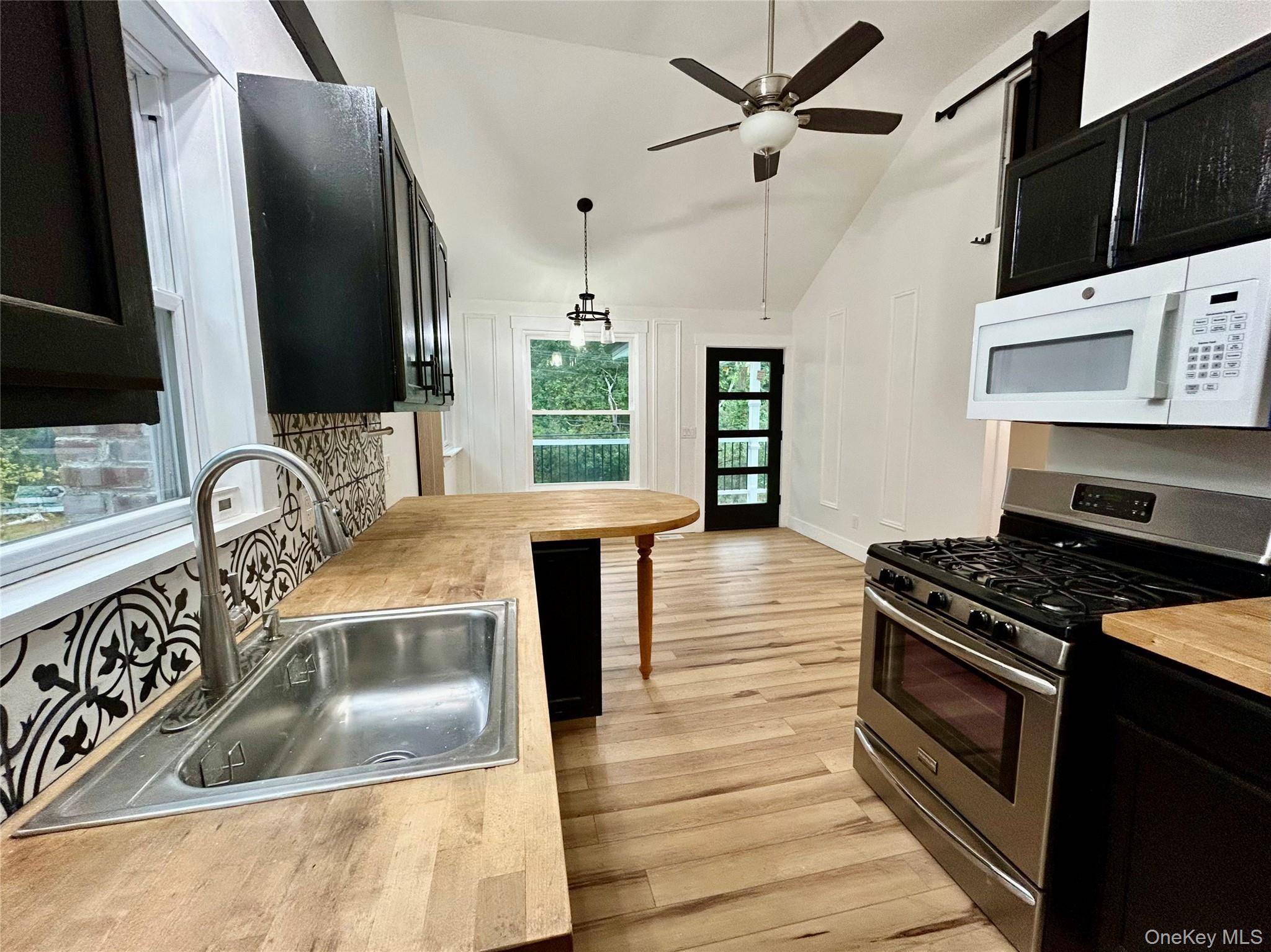Welcome home to this beautifully renovated 2 bedroom, 1 bath ranch sitting on a spacious half acre lot in the heart of Smithtown.