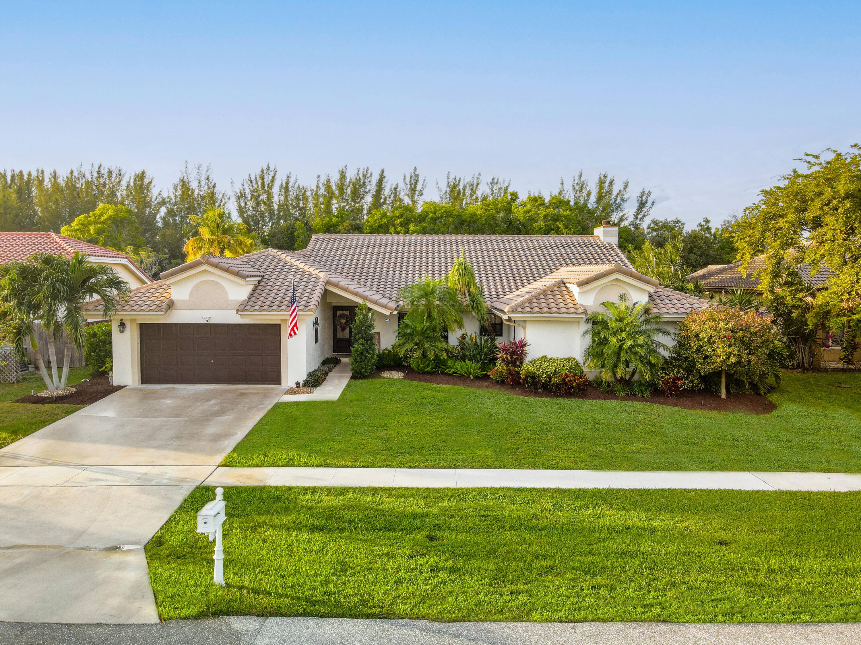 Welcome to a meticulously updated residence nestled in the prestigious community in West Boca Raton, FL.