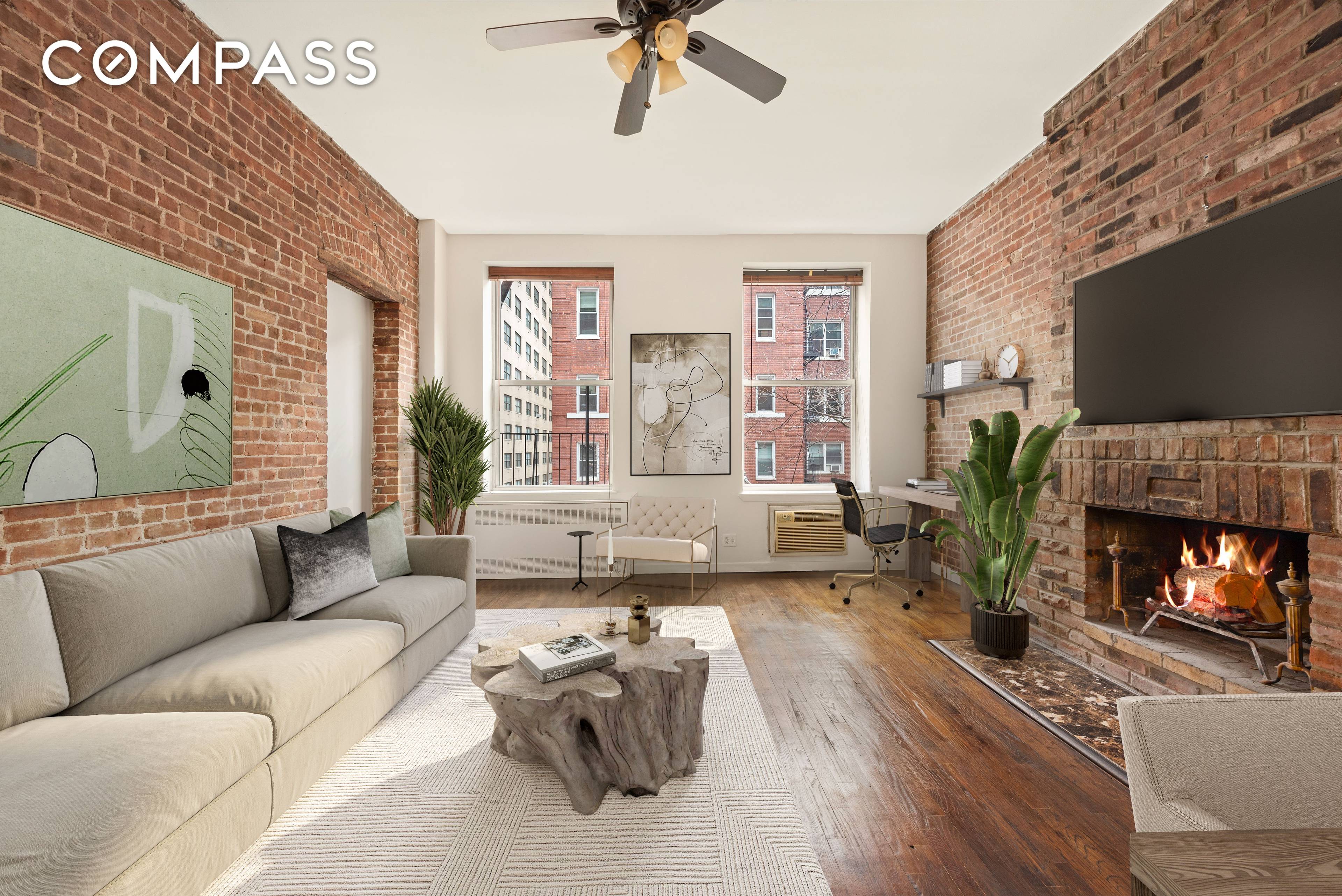 Discover incredible warmth and charming prewar details in this spectacular alcove studio in the heart of Midtown West Hell's Kitchen, just four blocks from Central Park.