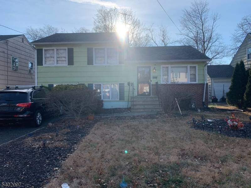 Spacious and sun filled split level home featuring five bedrooms and 2.