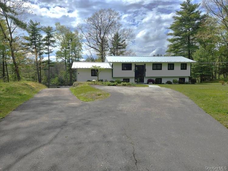 Beautifully and tastefully high quality renovated home on Browns Pond in the town of Clinton.