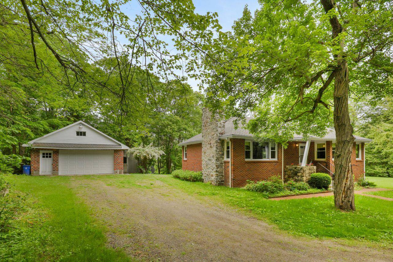 Charming Brick Ranch with Cottage set on 14 Acres near State Parks !