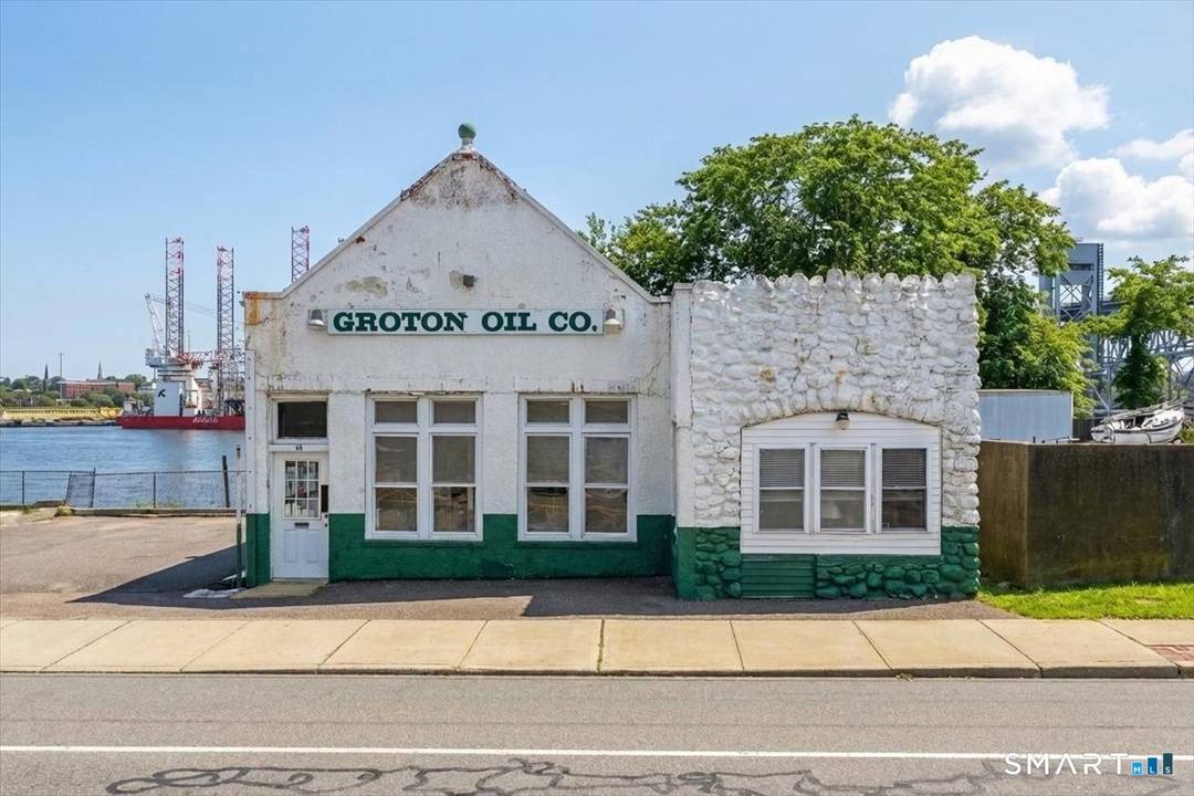 A rare opportunity to acquire direct Thames River frontage in the heart of Groton's historic commercial corridor.