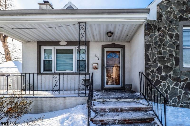 North facing, 5 bedroom home built in 1925 with a full, unfinished basement.