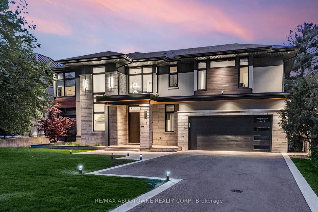 Stunning custom built modern home designed by David Small located in West Oakville.