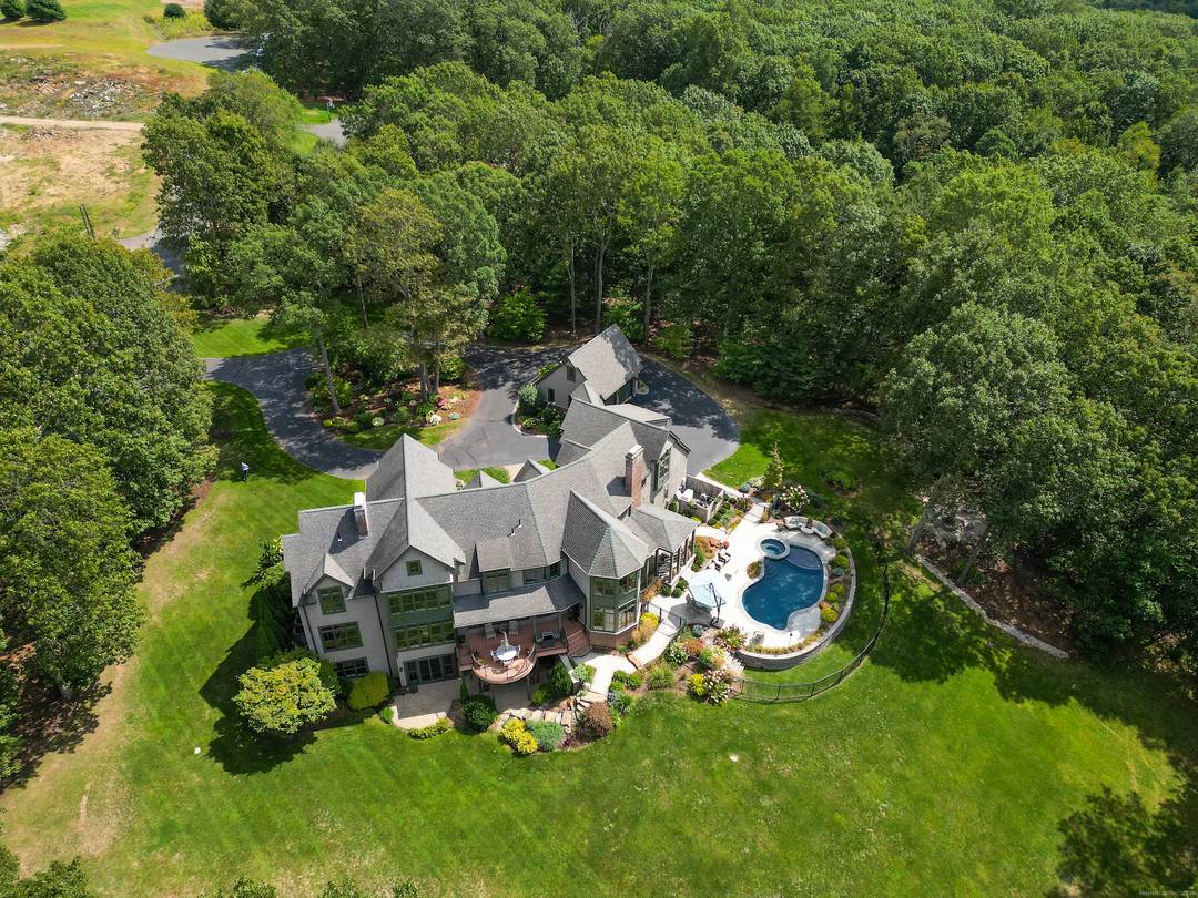 Perched on 4. 13 private acres with unobstructed 180 degree sunset views stretching from Hartford to Springfield, 6 Setting Sun Trail is a meticulously loved extraordinary custom estate and true ...