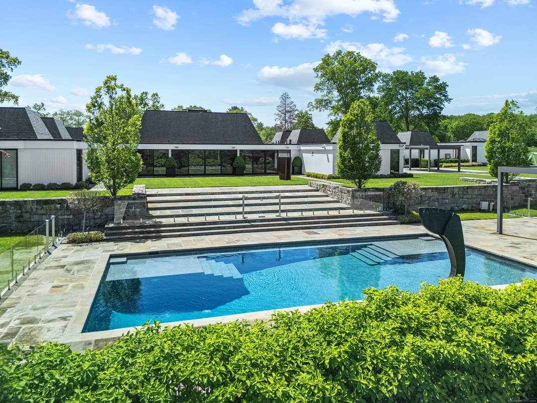 Surrounded by stone walls, this one of a kind, spectacular and private 36 acre Greenfield Hill country compound has had a stunning top level transformation, creating a breathtaking Fairfield County ...