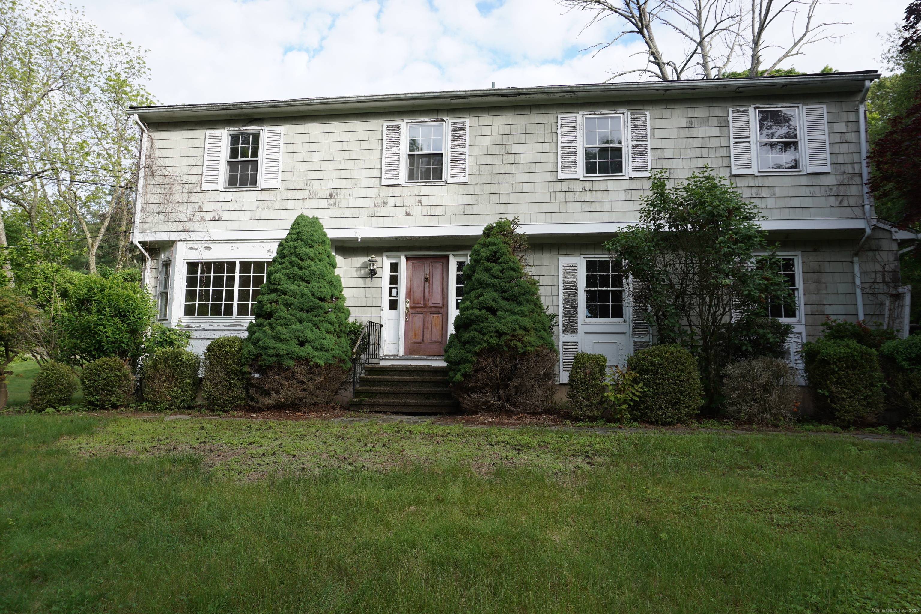 Diamond in the Rough ! This stately colonial is brimming with potential and ready to be restored to its former grandeur.