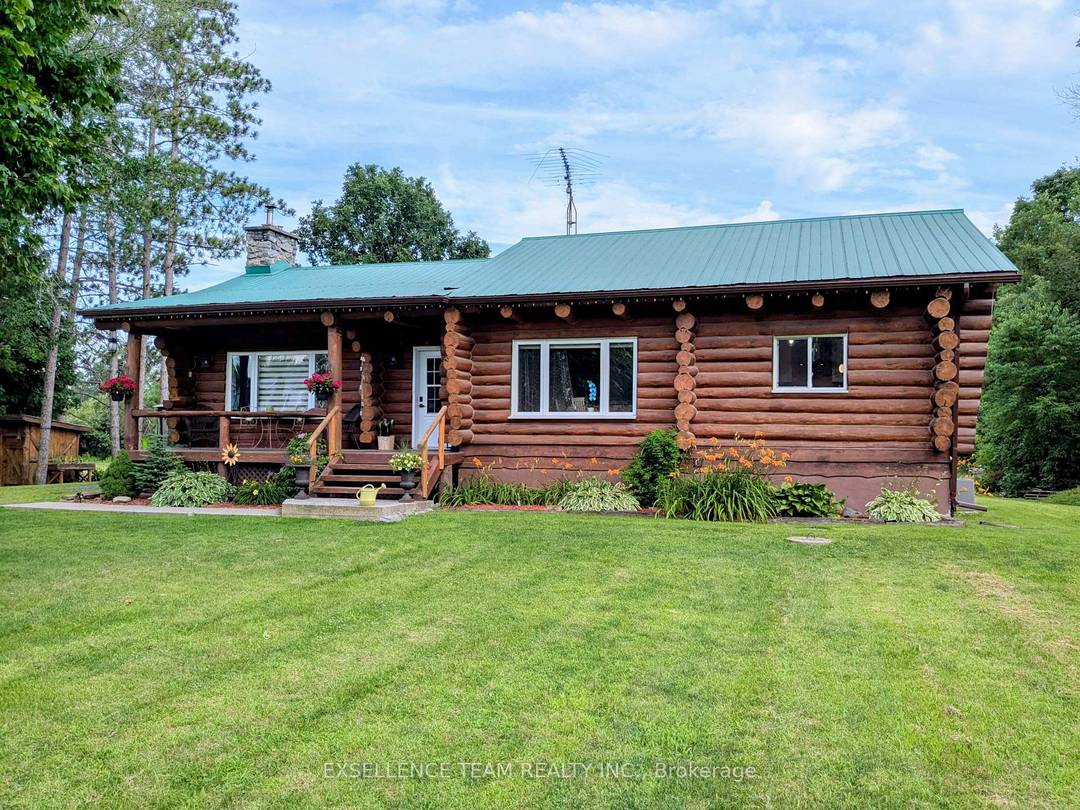 MOTIVATED SELLER ! ! ! Stunning Log Home with privacy on a large parcel lot, just minutes from Cornwall !