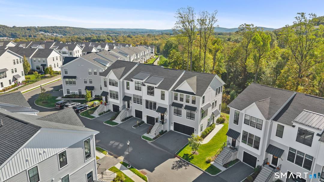 Welcome to luxury resort style living at 63 Brentwood Circle, a beautifully upgraded tri level townhome in one of Danbury's most sought after communities.
