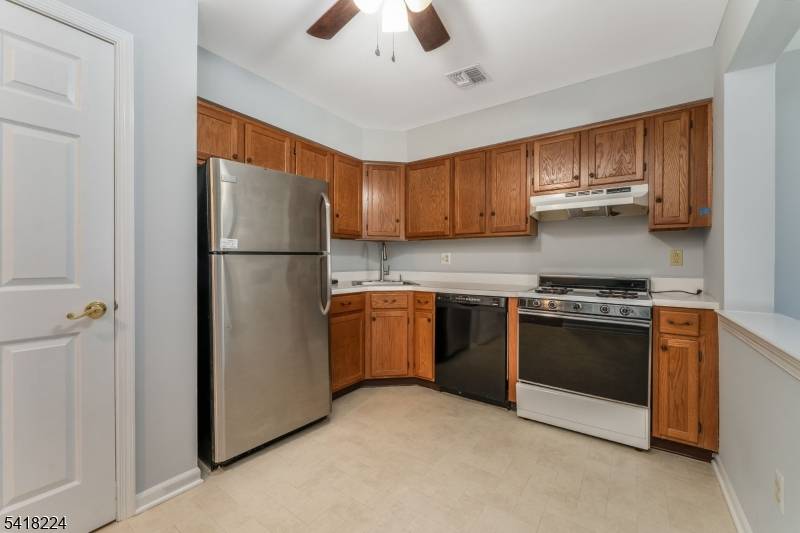Beautiful 3 bedroom, 2. 5 bathroom townhouse featuring updated flooring throughout the first floor and a brand new rear sliding door that brings in plenty of natural light.