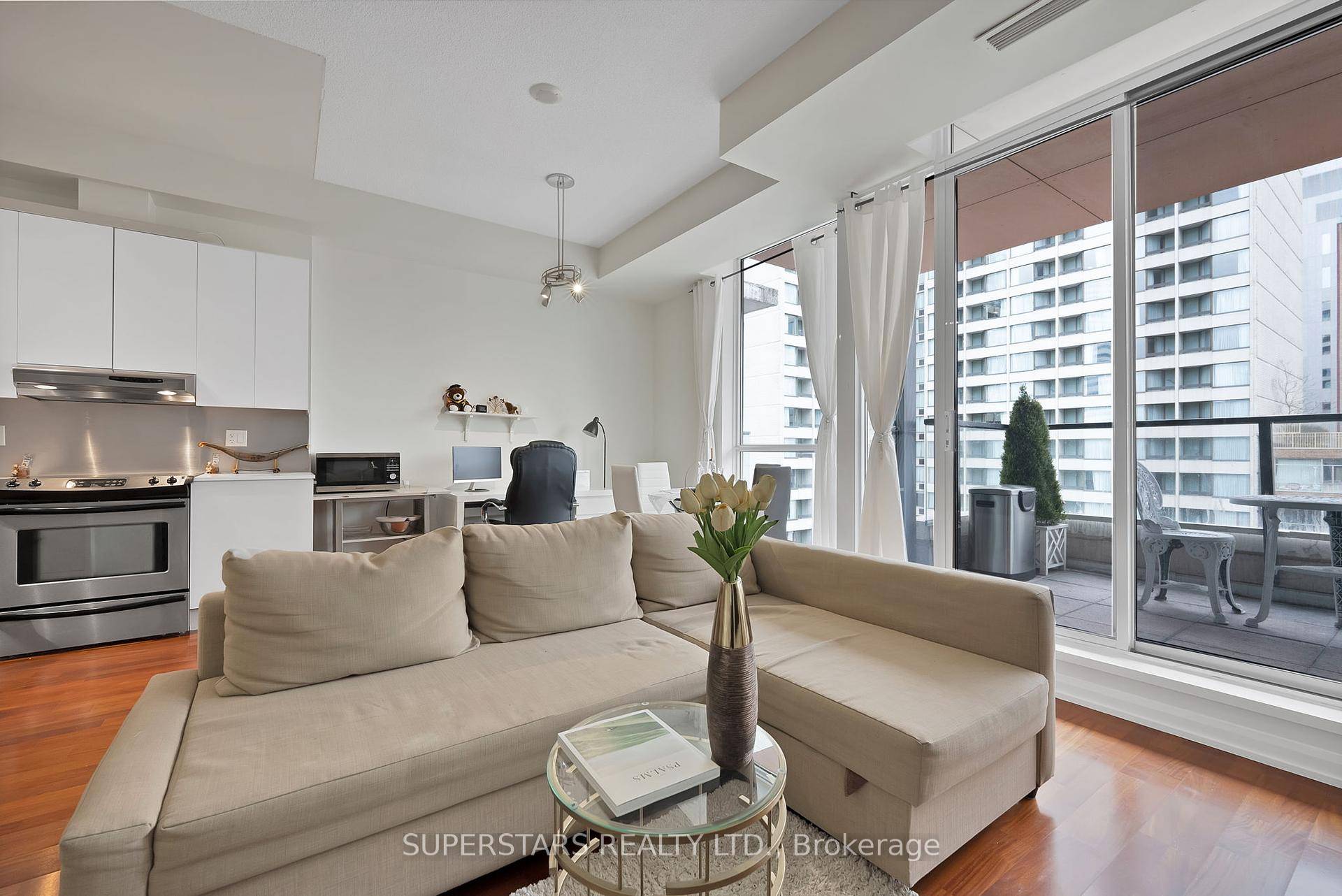 Welcome to the One City Hall Condo, a modern lower penthouse unit offering city living at its finest.