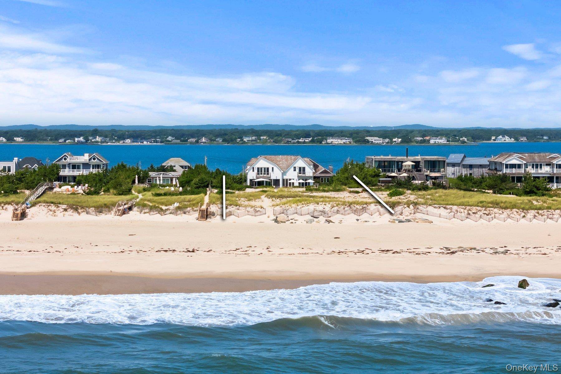 Set on 1 acre with 100 feet of direct ocean frontage, this shingled Post Modern has been renovated and reimagined for today's Hamptons living.