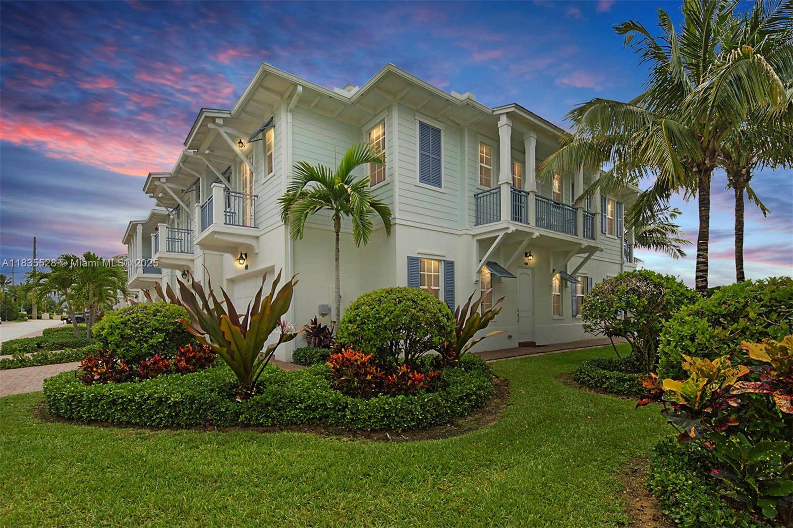 Experience coastal luxury in the heart of Juno Beach with this beautifully designed Key West style end unit townhome.