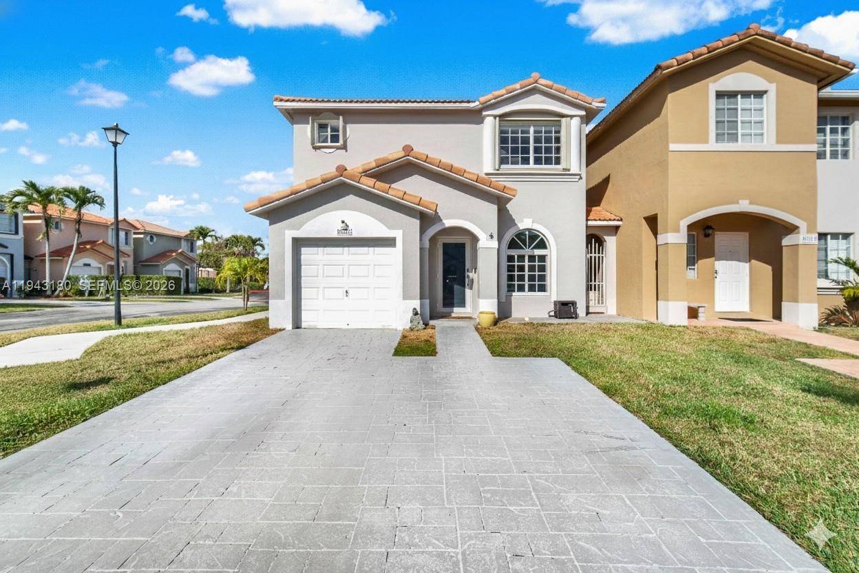 Beautifully remodeled detached townhouse on a desirable corner lot in the heart of West Kendall, one of the area s most sought after, family friendly communities.