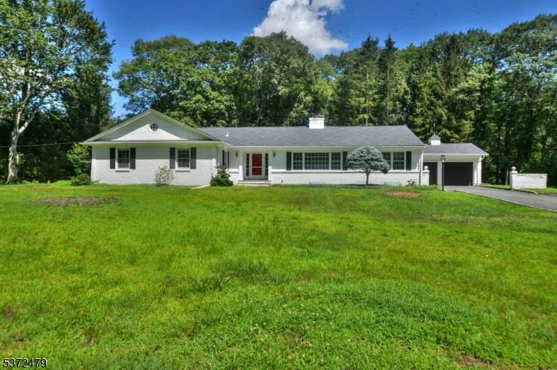 Nestled in the highly desirable Twin Brooks section of Chestnut Ridge, this classic ranch home enjoys an exceptional setting in prestigious Saddle River.