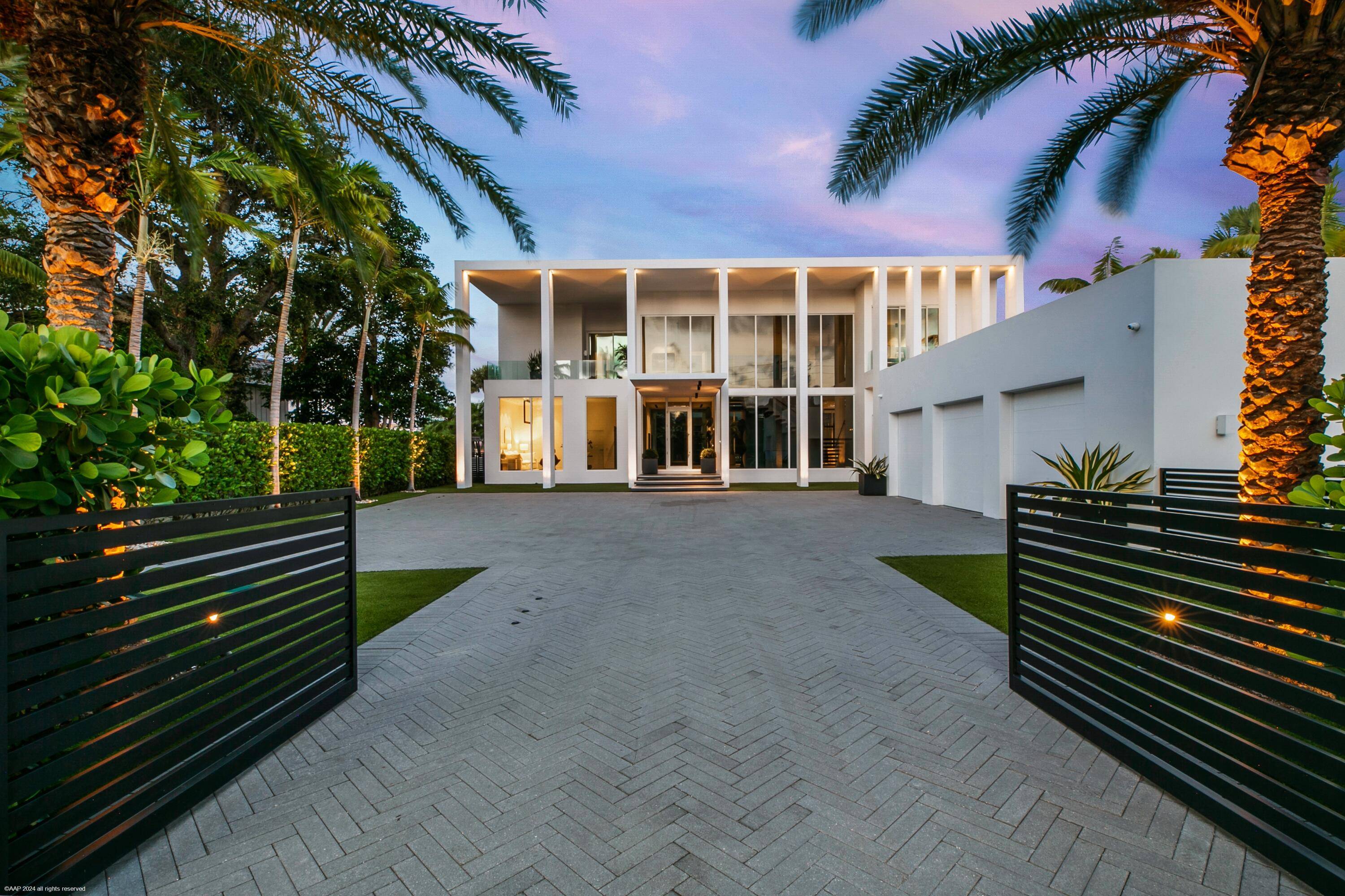 Nestled in prestigious Palm Beach Gardens, this stunning single family home epitomizes luxury living with its gorgeous water views and ultra modern design.