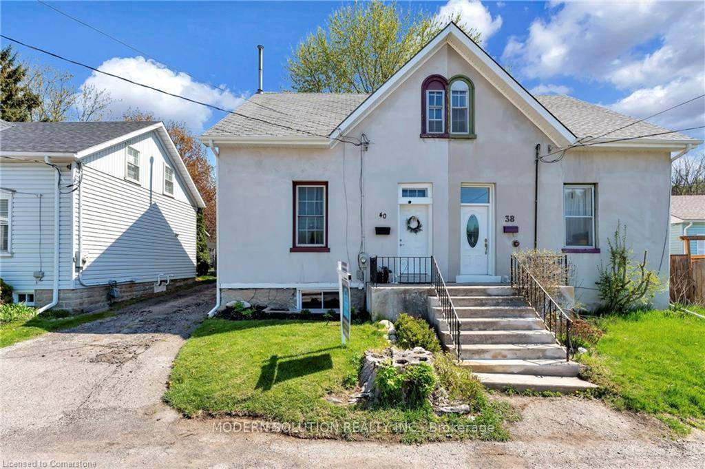 Welcome to 40 Walnut Lane, a charming 3 bedroom, 2 bathroom home with 9' ceilings and original trim that exudes character.