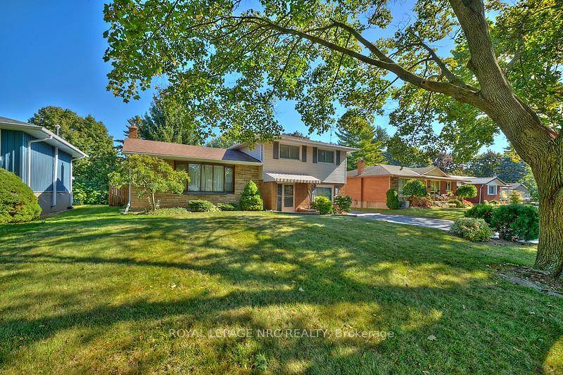 Same owners since 1972 in this well cared for 4 level side split in desirable north end location backing onto a creek.