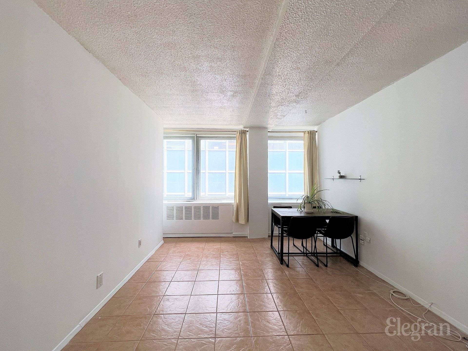 This beautifully converted 1 bedroom home features a full sized bedroom, a spacious living room, built in AC heater, ceiling fan, granite countertops, ample cabinetry for tidy storage, deep closets, ...