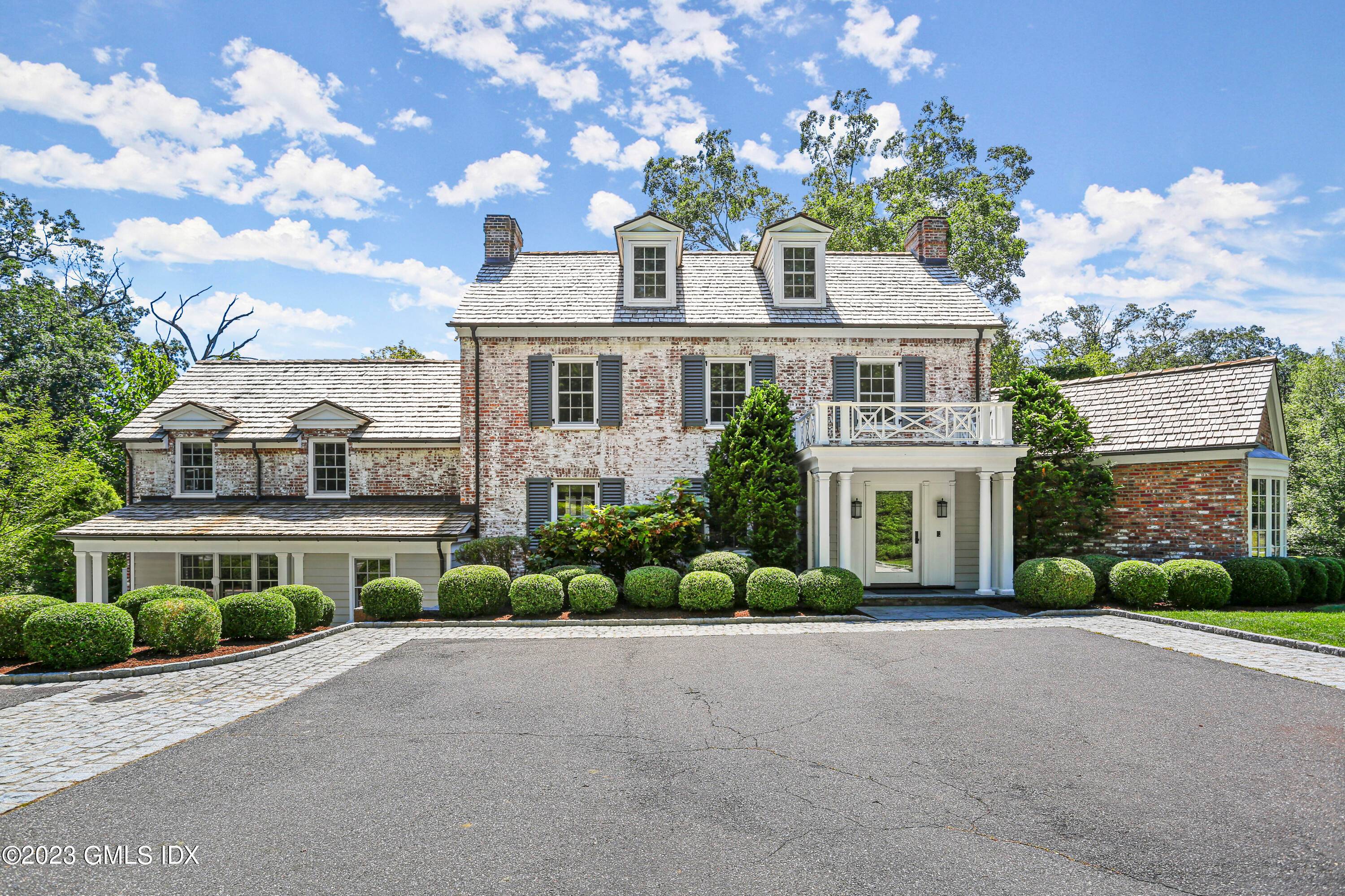 Classic Georgian brick five bedroom estate home with stunning and spacious interiors.