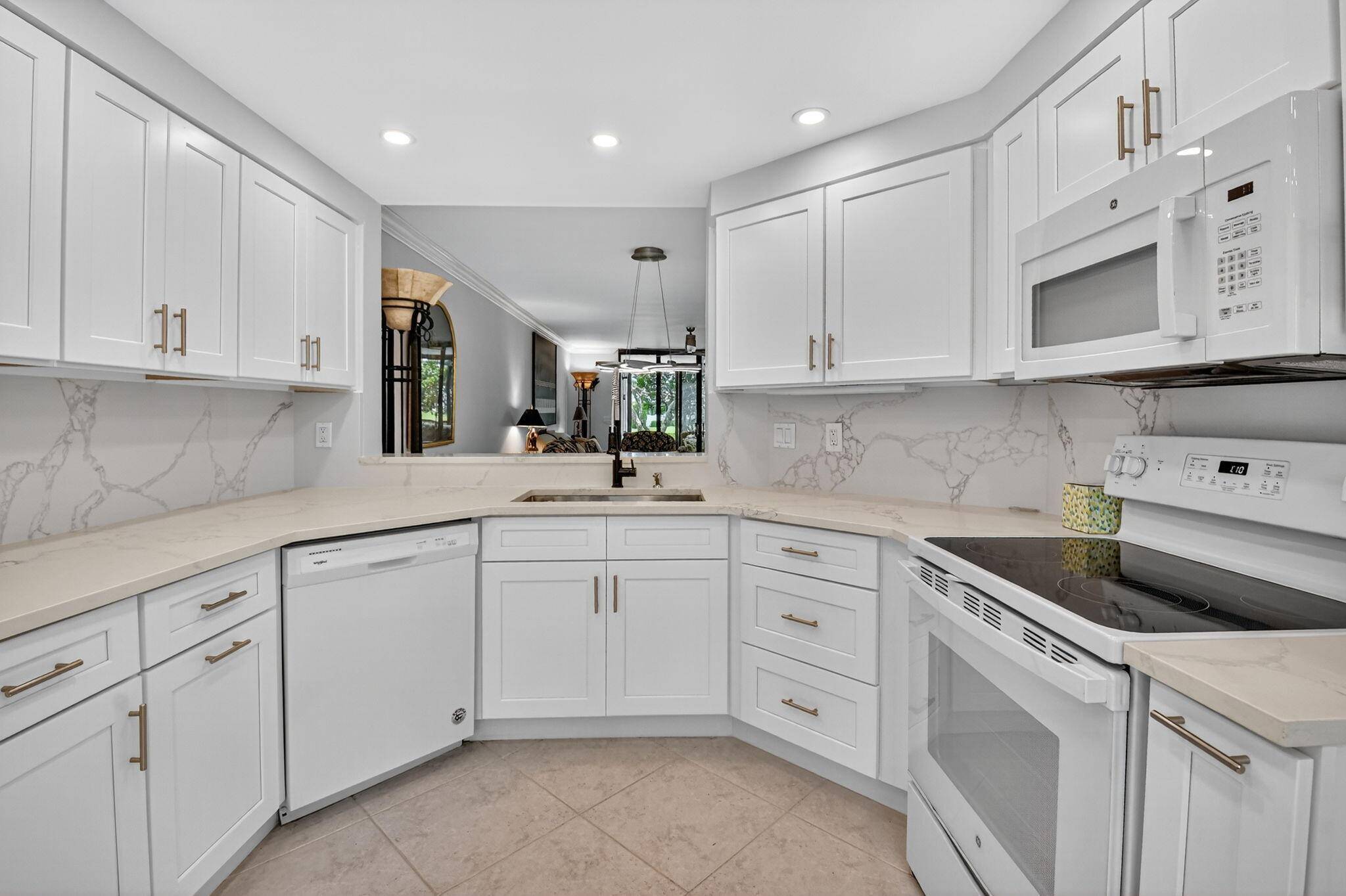 There is nothing lovelier than this 2 bedroom 2 bath first floor condo to spend your winter months.