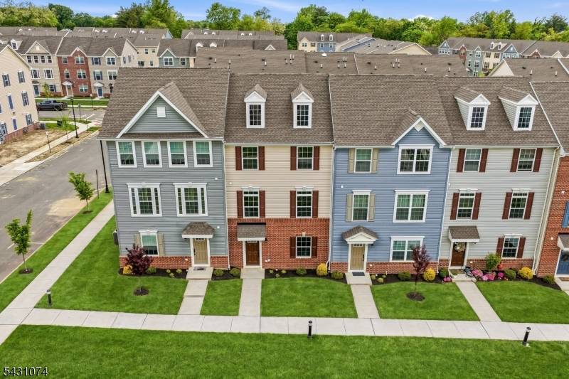 This is the one ! Stunning townhome located in the very desirable newer community of The Anchor at Glassworks in the Cliffwood section of Aberdeen Township.