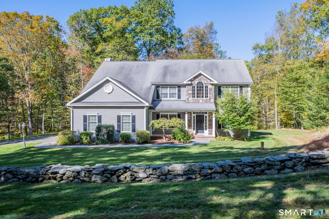 Tucked away in a private and peaceful setting, this beautifully appointed Colonial offers an exceptional blend of comfort, style and functionality.