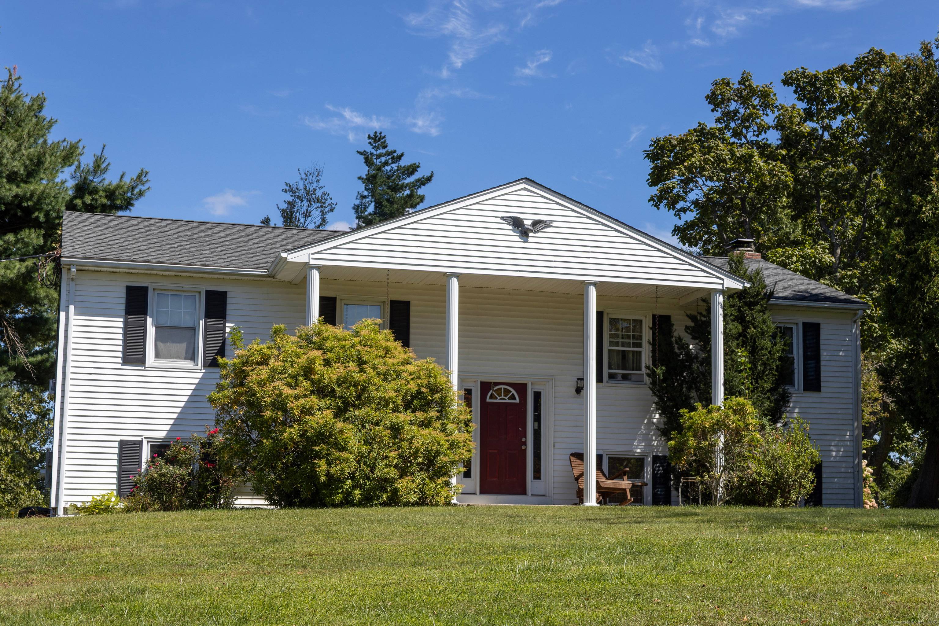 Welcome to this inviting raised ranch in the heart of Brookfield, offering an open concept floor plan designed for modern living.