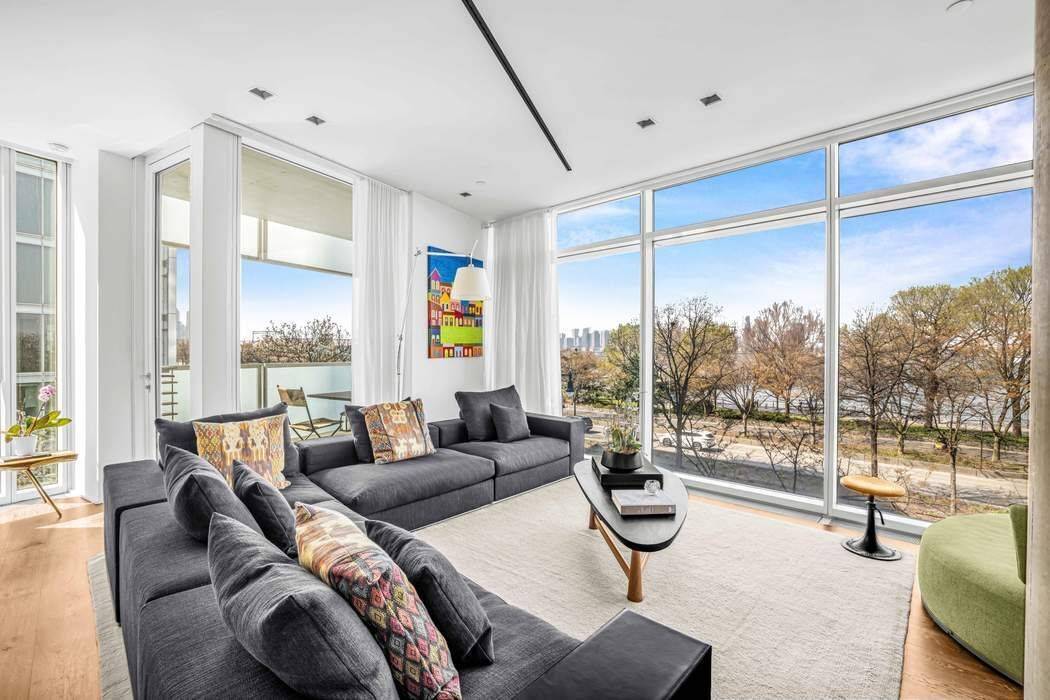 Residence 3N at 173 Perry Street is a triple mint, contemporary full floor home spanning approximately 1, 853 square feet.