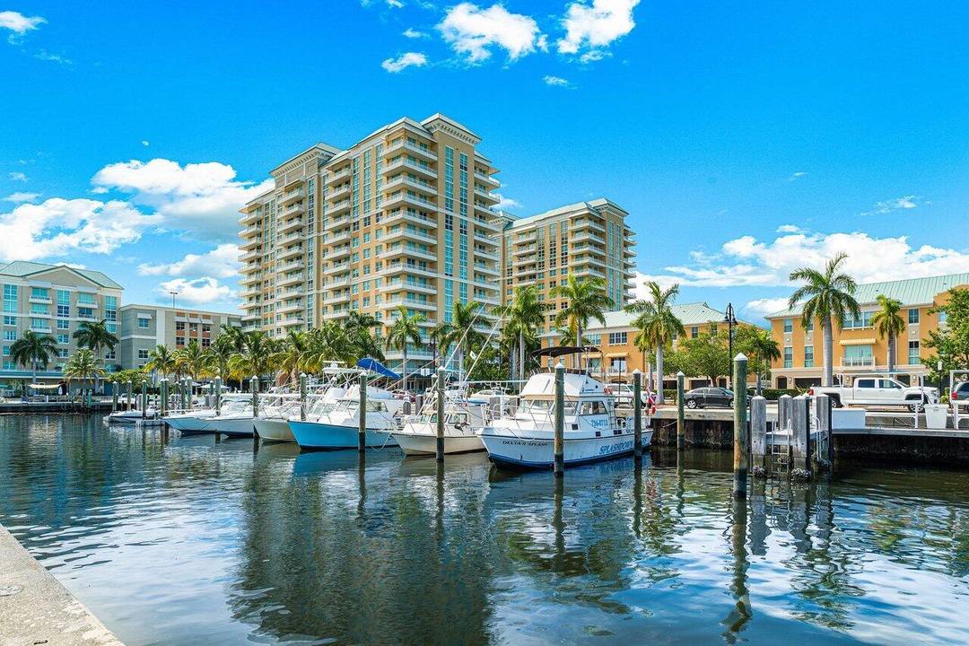 Live where others vacation and enjoy the best of South Florida's waterfront lifestyle in this fully furnished 2 bed, 2 bath condo in the sought after Marina Village community.